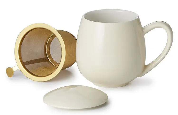 Mug Cream with gold-coloured infuser strainer and lid