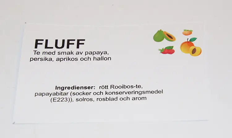Butikburksskyltar med  text och bild