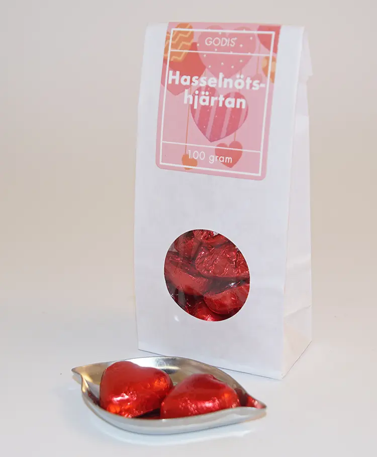 Hasselnötshjärtan rött papper vit påse med fönster 100g