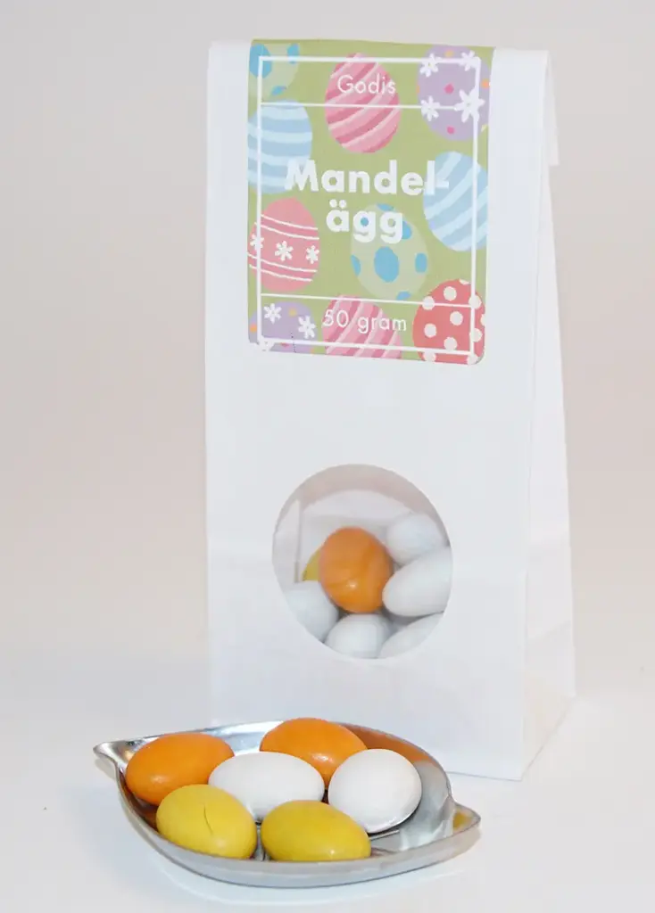 Almond eggs Anthon Berg white bag with window 50g