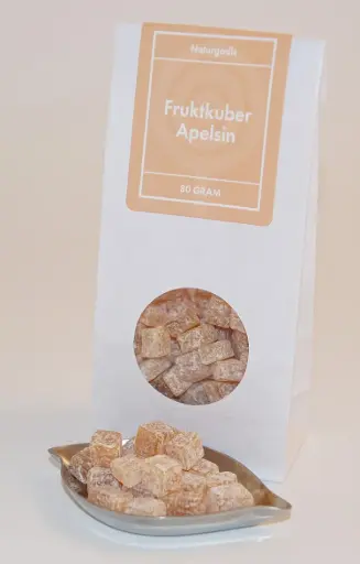 [L9793] Fruktkuber Apelsinsmak i vita påsar med fönster 80g