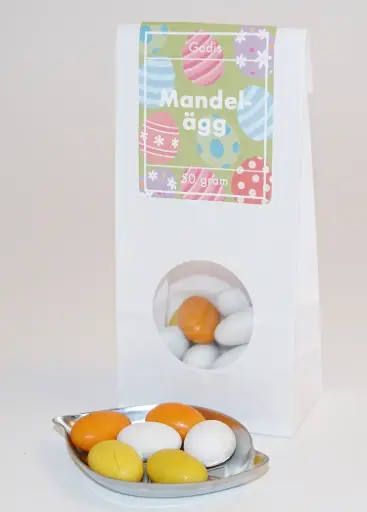 [L9814B] Almond eggs Anthon Berg white bag with window 50g