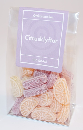 [P9150] Citrusklyftor örtkarameller i ståpåse 100g